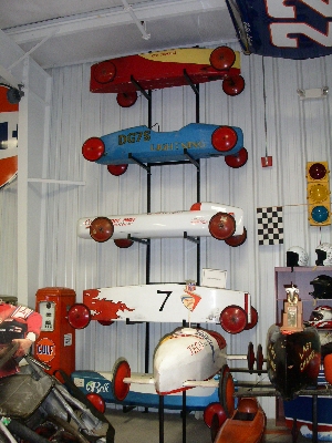 [vertical display of 5 soap box cars.]